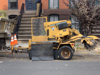 This photo is of service equipment used to dig beyond soil grade for stump and root removal along with grinding.